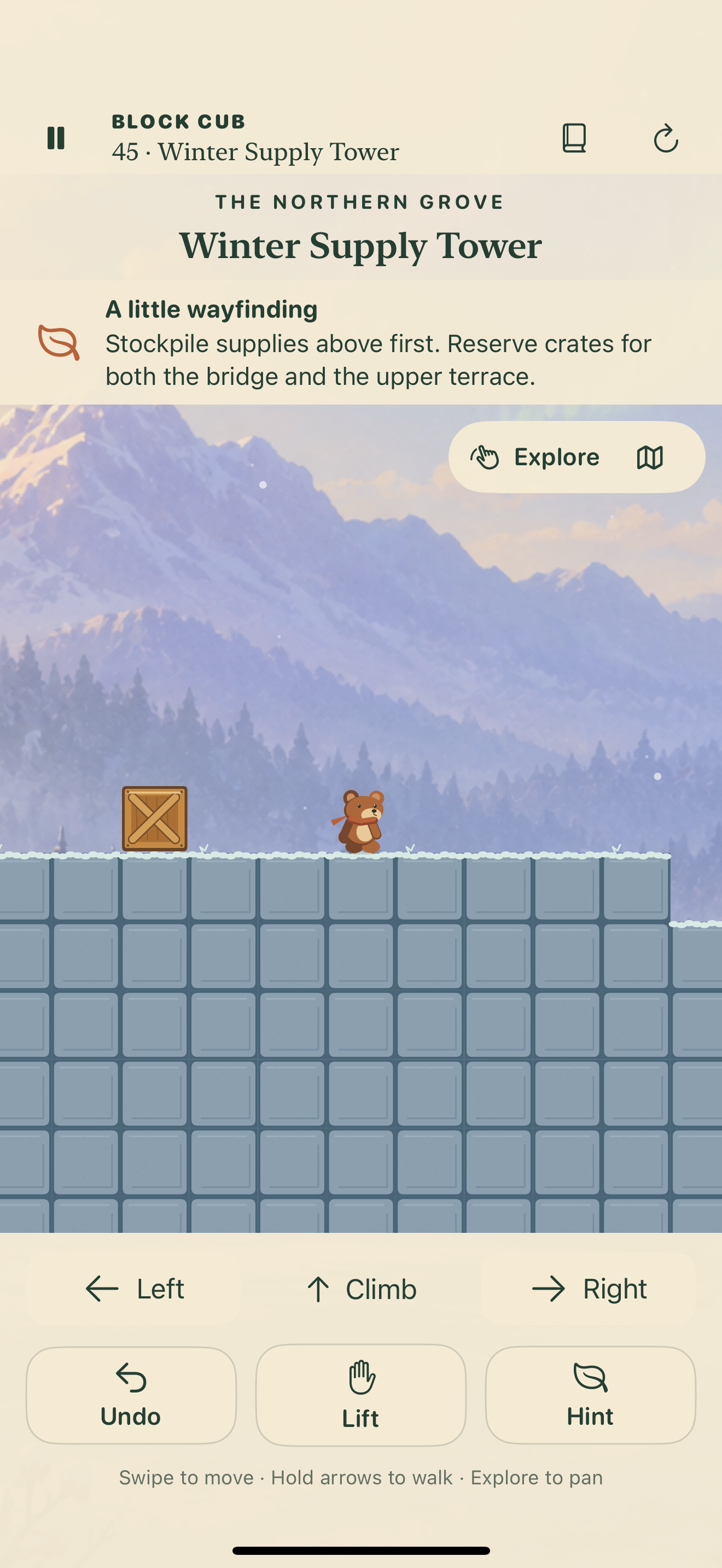 Actual Frostbound gameplay with icy platforms and sliding crates.